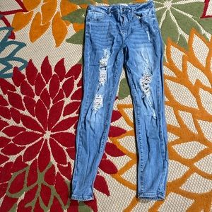 Distressed high rise skinny jeans